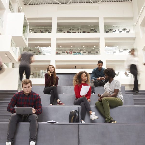 Interior Of Busy University Campus Building With Students